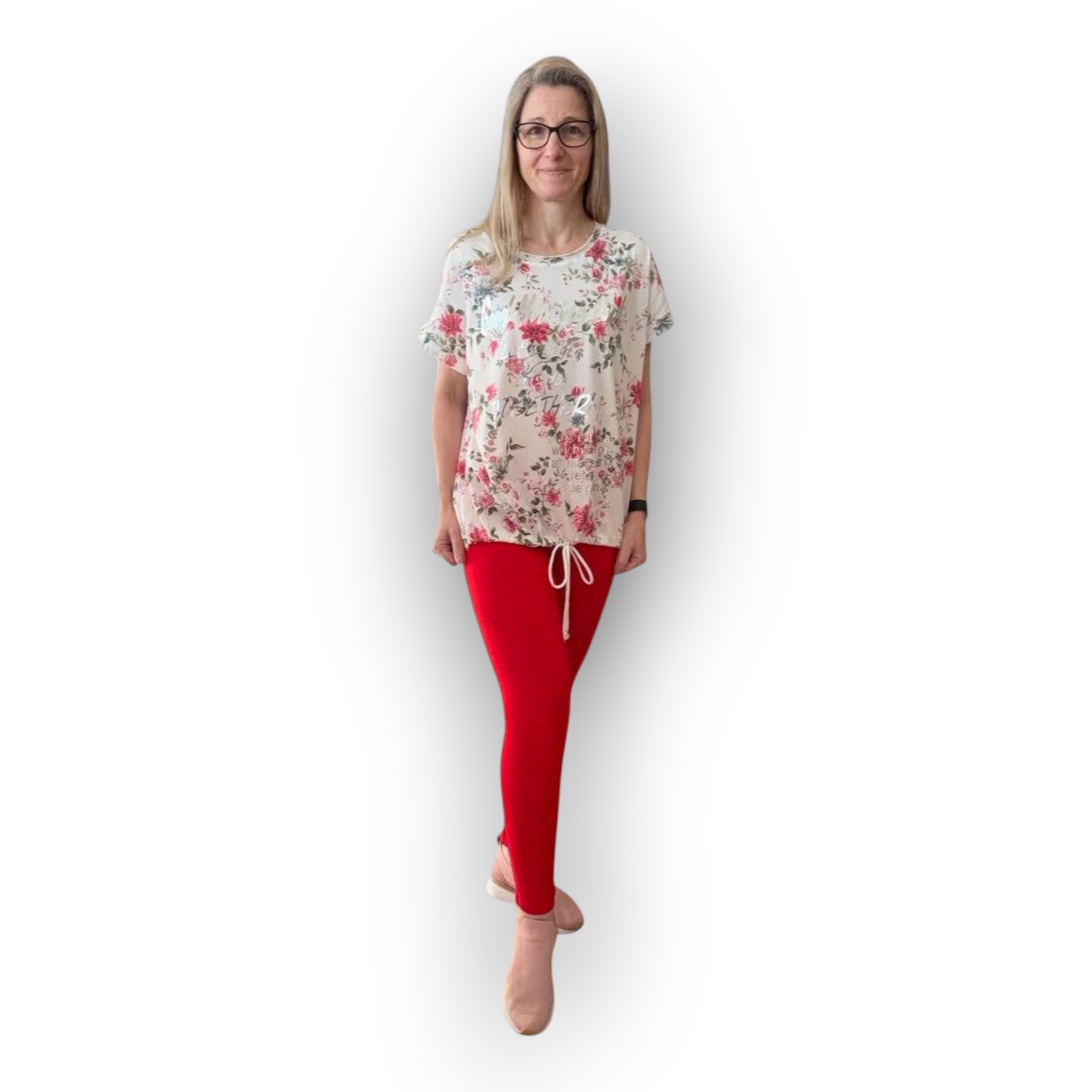 Horszi KO-GO piros, hosszú szárú, rugalmas pamut női leggings, amelyet egy nő visel virágos felsővel.